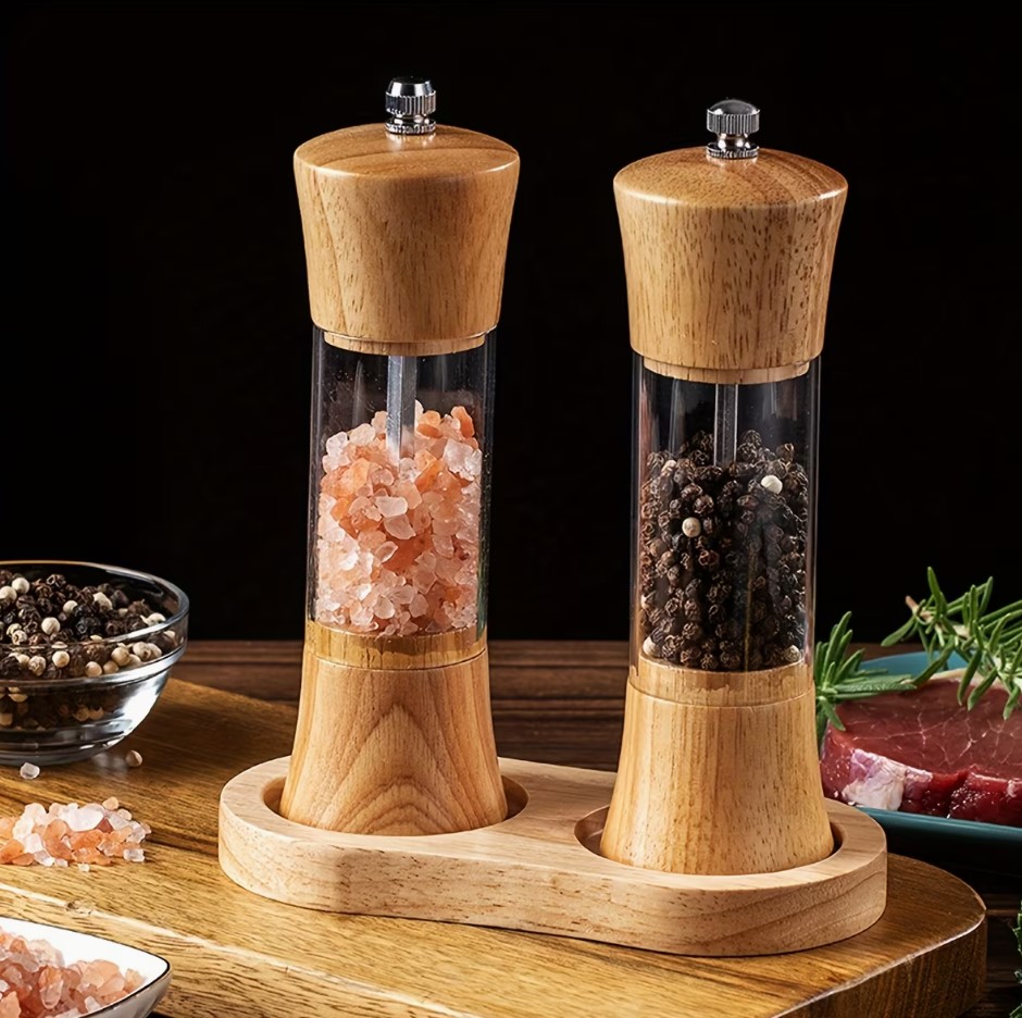 Wooden salt and pepper mill set on acacia tray