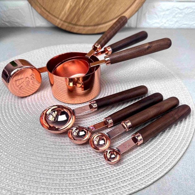 Rose gold copper measuring cups and spoons with walnut handles